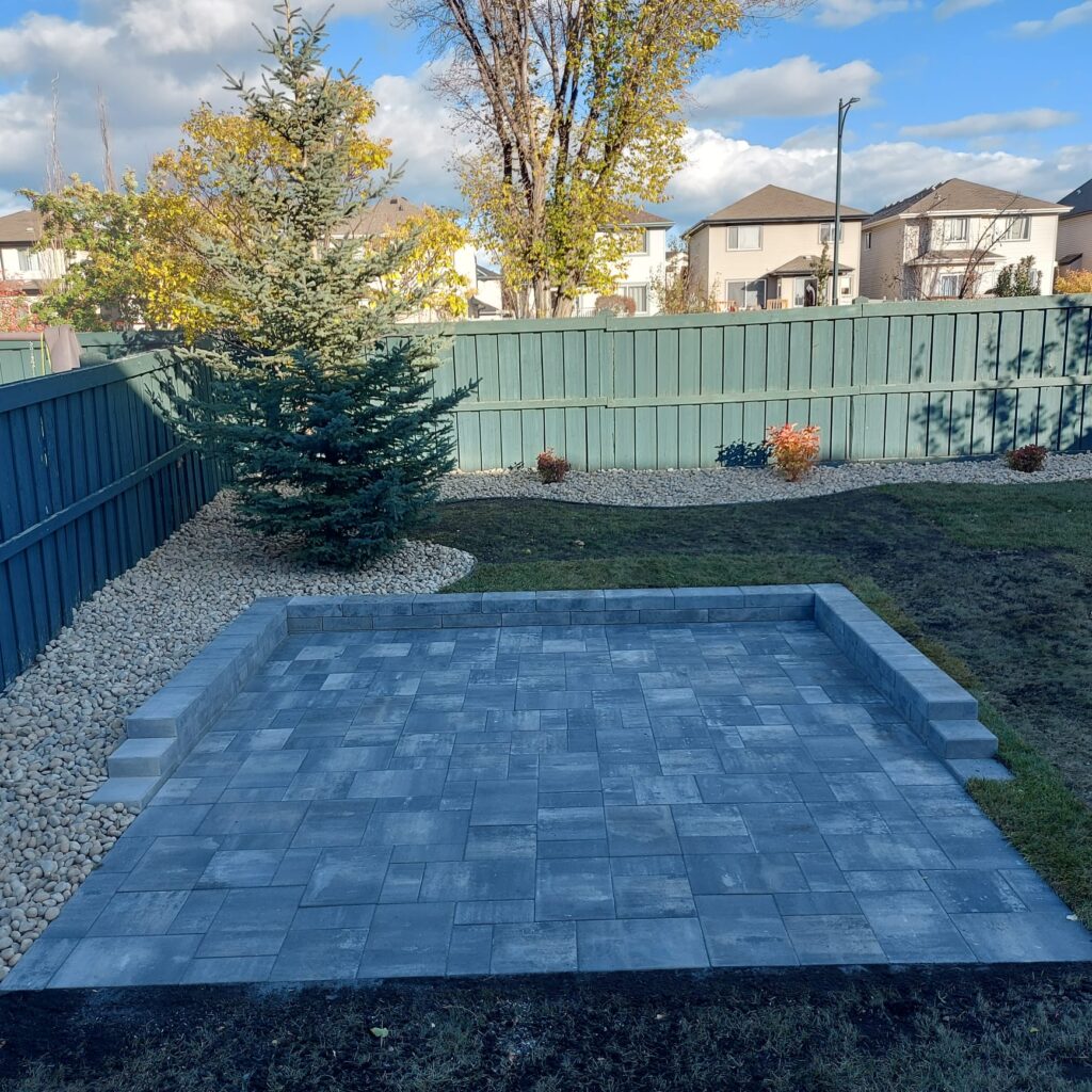 Stone patio with decorative rock